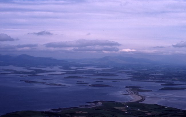The  view from the top of Croagh Patrick looking north across the bay and islands to the mountains on the north shore of the bay.