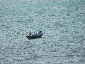 Currach at anchor off Omey