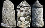 Two typical Rathlin gate pillars and a standing stone. Note the pillar in the centre with its mixture of light coloured chalk and darker basalt.