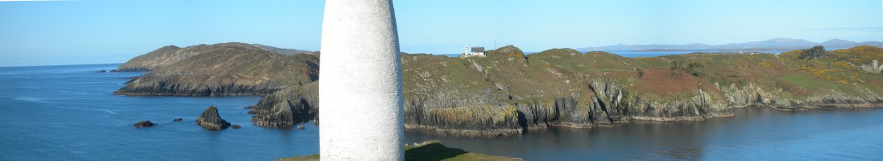 Navigation pillar above the entrance to Baltimore Harbour with Sherkin on the other side. 